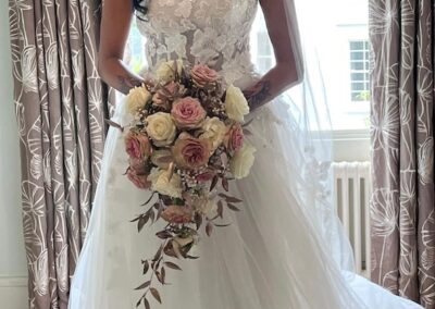 Rose gold foliage with ivory and pale pink roses